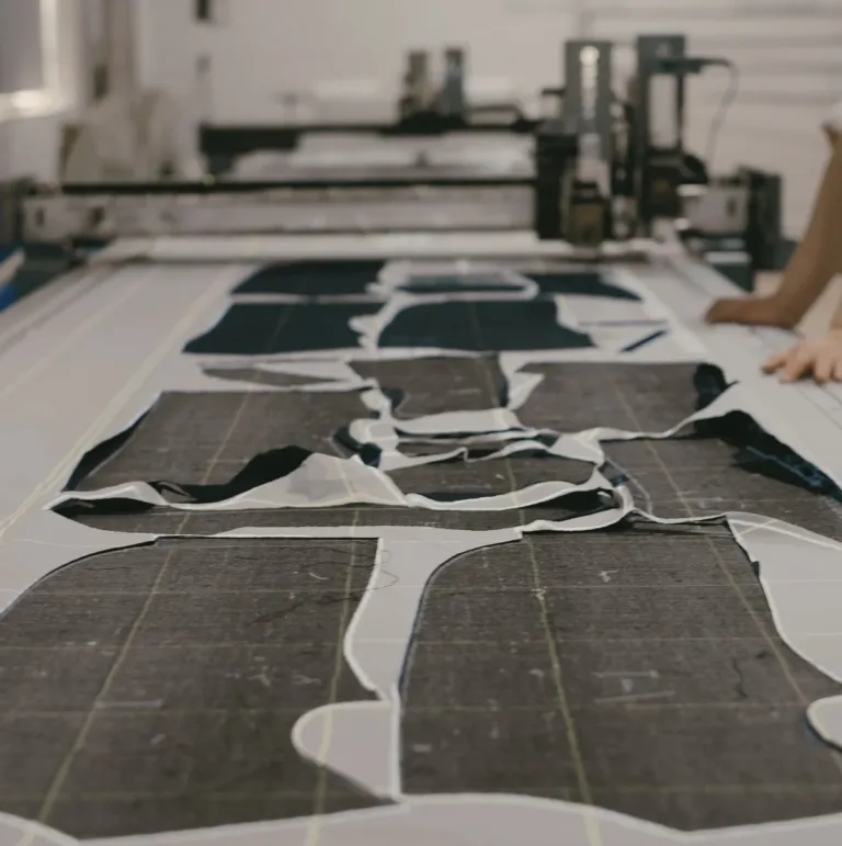 Garment panels arranged on a cutting table