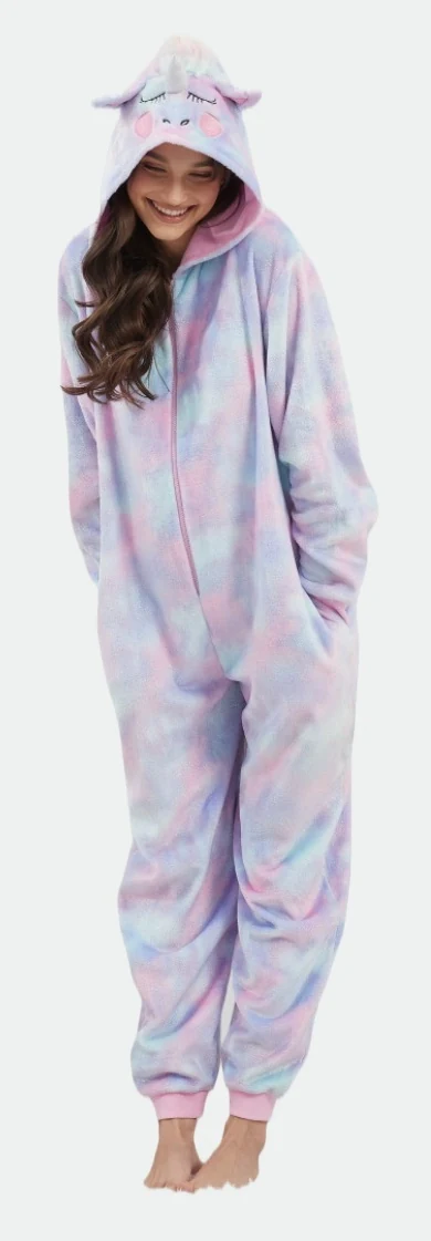 Standing adult wearing a pastel pink-and-blue hooded onesie with long legs