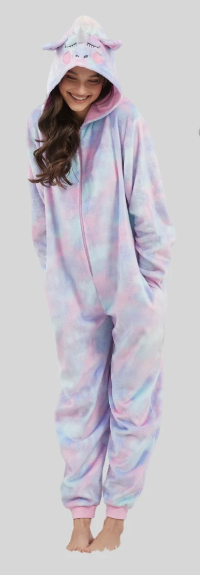 Standing adult wearing a pastel pink-and-blue hooded onesie with long legs